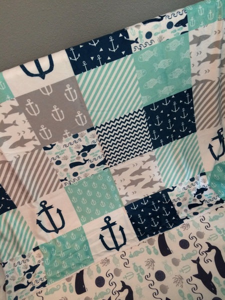 Double Minky Baby Blanket in navy and gray with a nautical theme including anchors, Sharks, fish and chevron
