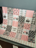 Double Minky Baby Girl Farm Life Baby Blanket in pink, and gray with modern farm designs including tractors, plaid and farm animals