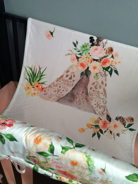 Double minky baby girl blanket with a boho woodland theme featuring a teepee with peach and pink floral accents