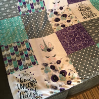 Double Minky Baby Girl Blanket in purple, turquoise, and gray with a unicorn theme with floral, arrows, paisley and polka dots