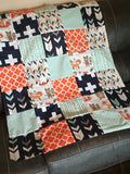 READY TO SHIP - Patchwork blanket with a modern woodland theme including foxes and bears, trees, and arrows in orange, navy, and mint