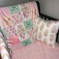 Double Minky Baby Girl Blanket with a modern boho theme featuring dreamcatchers, feathers, florals, and dream big little one prints