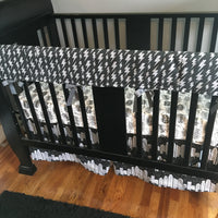 Superhero Baby Boy Bedding in mono chrome black gray and white with comic book bubbles, sky scrapers and super hero fabrics