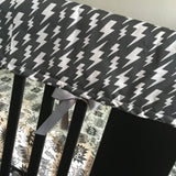 Superhero Baby Boy Bedding in mono chrome black gray and white with comic book bubbles, sky scrapers and super hero fabrics