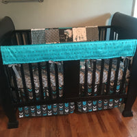 Wild and Free Baby Boy Bedding in turquoise, black and gray with a modern boho tribal theme with dream catchers, little chief, and feathers