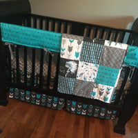 Wild and Free Baby Boy Bedding in turquoise, black and gray with a modern boho tribal theme with dream catchers, little chief, and feathers