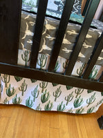 Made to Order Baby Bedding with a western boho theme with cactus, cow, and Aztec prints in dark green, gray and black